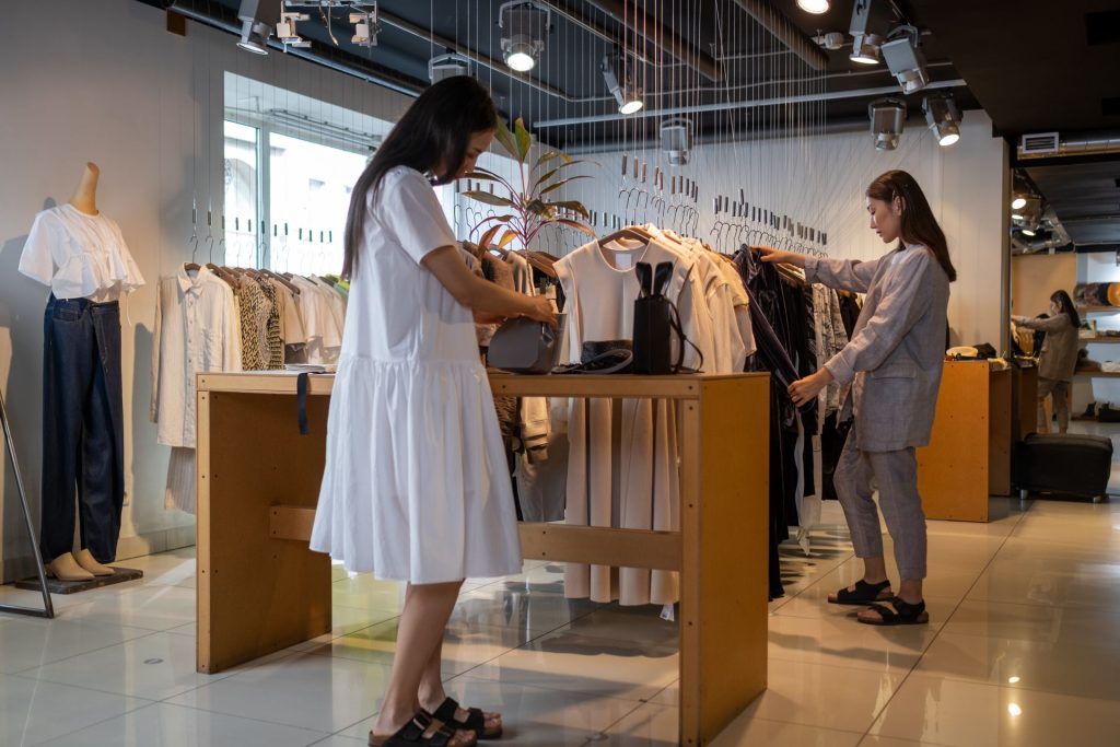 Retail store interior lit by ceiling track lighting